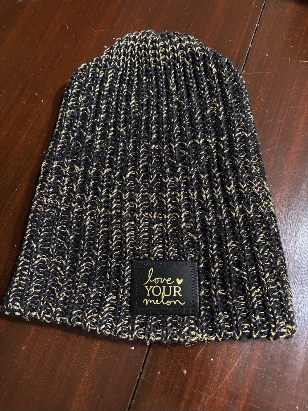 Love Your Melon Black and Gold Marled Knit Beanie